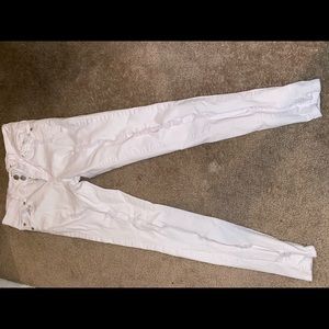 White ripped pants